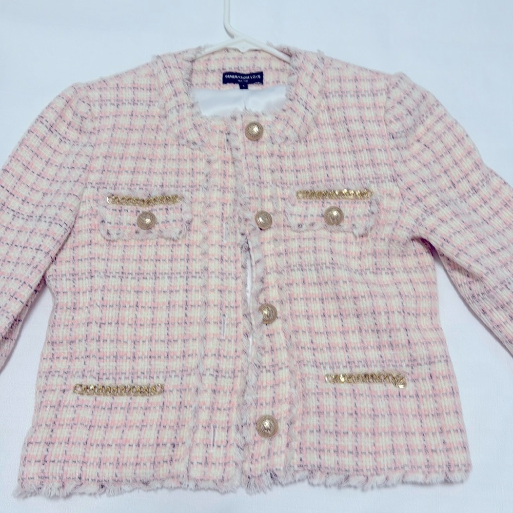 This elegant blazer , never wore would be yours in very good price